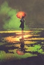 Mysterious woman holds umbrella standing in a puddle