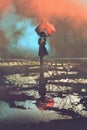 Mysterious woman holds umbrella standing in a puddle