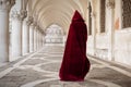 Mysterious woman in red cloak