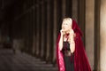 Mysterious woman in red cloak Royalty Free Stock Photo