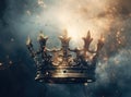 mysteriousand magical image of woman's hand holding a gold crown over gothic black background. Medieval period Royalty Free Stock Photo