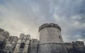 Mystery ruins of medieval old tower of castle under dark scary cloudy sky in Matera Italy Royalty Free Stock Photo