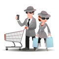 Mystery shopper man with shopping cart phone and woman bag in spy coat