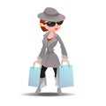 Mystery shopper woman in spy coat with shopping paper bags Royalty Free Stock Photo