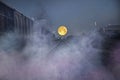 Mystery smoke over the track in full moon night Royalty Free Stock Photo