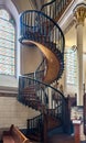 Mystery Staircase in Loretto Chapel, Old Town Santa Fe, New Mexico with stained glass windows