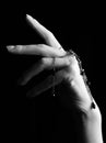 Mystic black & white female hand with gothic chain Royalty Free Stock Photo