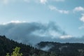 Mystic cloudy landscape on green Greek hills