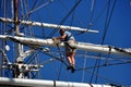 Mystic, CT: Crew Unfurling Sails on Whaling Ship