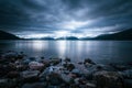 Mystic landscape lake scenery in Scotland: Cloudy sky, sunbeams and mountain range in loch Linnhe