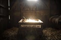 Mystic light in old barn with manger Royalty Free Stock Photo