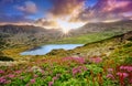 Mystic mountain sunset with lake in autumn Royalty Free Stock Photo