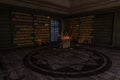 Mystic room or alchemist`s study room with candles, books, bottles and alchemical symbols, with zoom in on the book from the enter Royalty Free Stock Photo