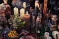 Mystic still life with skull, candles, flask and vintage bottles