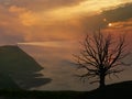 Mystic sunset scenery with cliffs and lighthouse, england