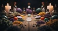 Mystical altar with candles and colorful crystals and herbs Royalty Free Stock Photo