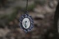 Mystical Ancient Pendant in Nature. Soft Vintage Old Jewelry Romantic Gothic Era in Garden