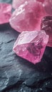 A mystical close-up of rose quartz, set on a dark, textured surface and enchanting bokeh