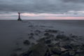 Mystical foggy sea and rocky shore in the evening