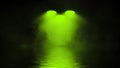 Mystical green spotlight with smoke reflection in water. Light projector illuminated for concert and game Royalty Free Stock Photo