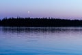 Mystical moon above the dark night forest near the lake, fantastic fabulous background