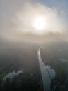 Mystical Morning: Aerial Panoramic View of River, Farm Field, and Forest Landscape in Morning Fog and Sunrise Royalty Free Stock Photo