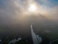 Mystical Morning: Aerial Panoramic View of River, Farm Field, and Forest Landscape in Morning Fog and Sunrise Royalty Free Stock Photo