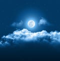 Mystical Night sky background with full moon, clouds and stars. Moonlight night with copy space for winter background Royalty Free Stock Photo