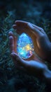 Mystical opal glowing between hands in a calming natural setting. Royalty Free Stock Photo