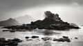 Mystical Rock Island: A Captivating Black And White Photograph