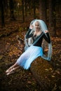 Halloween time, girl in white veil at forest Royalty Free Stock Photo