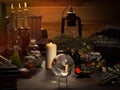 Mystical still-life. Magic ball, dry herbs, all for magical rituals. A lot of items. Candles
