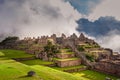 Mystical view on the Machu Picchu city ruins covered with fog