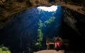 Mystique view to the Phraya Nakhon Cave with the Khuha Kharuehat Pavilion illuminated by Sun through the Hole in the Rocky Top