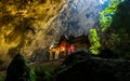 Mystique view to the Phraya Nakhon Cave with the Khuha Kharuehat Pavilion illuminated by Sun through the Hole in the Rocky Top