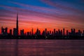 Mythical morning, sunrise or dusk in Dubai. Dawn over Burj Khalifa. Beautiful colored cloudy sky over Dubai downtown Royalty Free Stock Photo