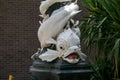 Mythological fish decoration on a lamp post near Hyde Park, London, UK, close-up