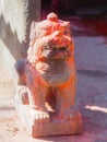 Mythological lion with red pigment guarding shrine at Kali Temple, worshiping Goddess Kali at Dhulikhel in Nepal Royalty Free Stock Photo