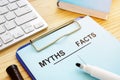Myths and facts list with pen. Fake news concept Royalty Free Stock Photo