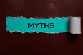 Myths Text written in torn paper