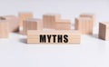 Myths Word In Wooden Cube Stamp with wooden blocks.