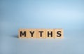 Myths word on wooden cubes. Myths concept Royalty Free Stock Photo