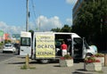 Mobile office of auto insurance near the traffic police building.