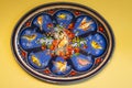 Mytishy district, RUSSIA - JULY, 2019: Zhostovo factory museum. Editorial Blue oval metal tray with painting