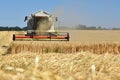 Combine harvester on grain field in the Salzkammergut Royalty Free Stock Photo