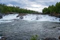 MÃÂ¥lselvfossen waterfall in Norway in summer Royalty Free Stock Photo