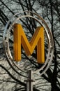 A yellow MÃÂ©tro sign in place de la Bastille