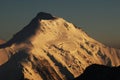 MÃÂ¶nchshÃÂ¼tte: GLobal clima change: Bernese swiss mountain peak with melting glacier at sunset near Grindelwald