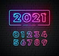 2021 colorful neon light number happy new year and colorful numbers collection on block wall black background Royalty Free Stock Photo