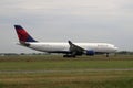 N857NW Delta Air Lines Airbus A330 Aircraft landing at the Polderbaan 36L-18R at the Amsterdam Schiphol airport in the Netherlands Royalty Free Stock Photo